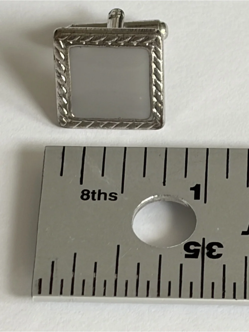 unknown silver square